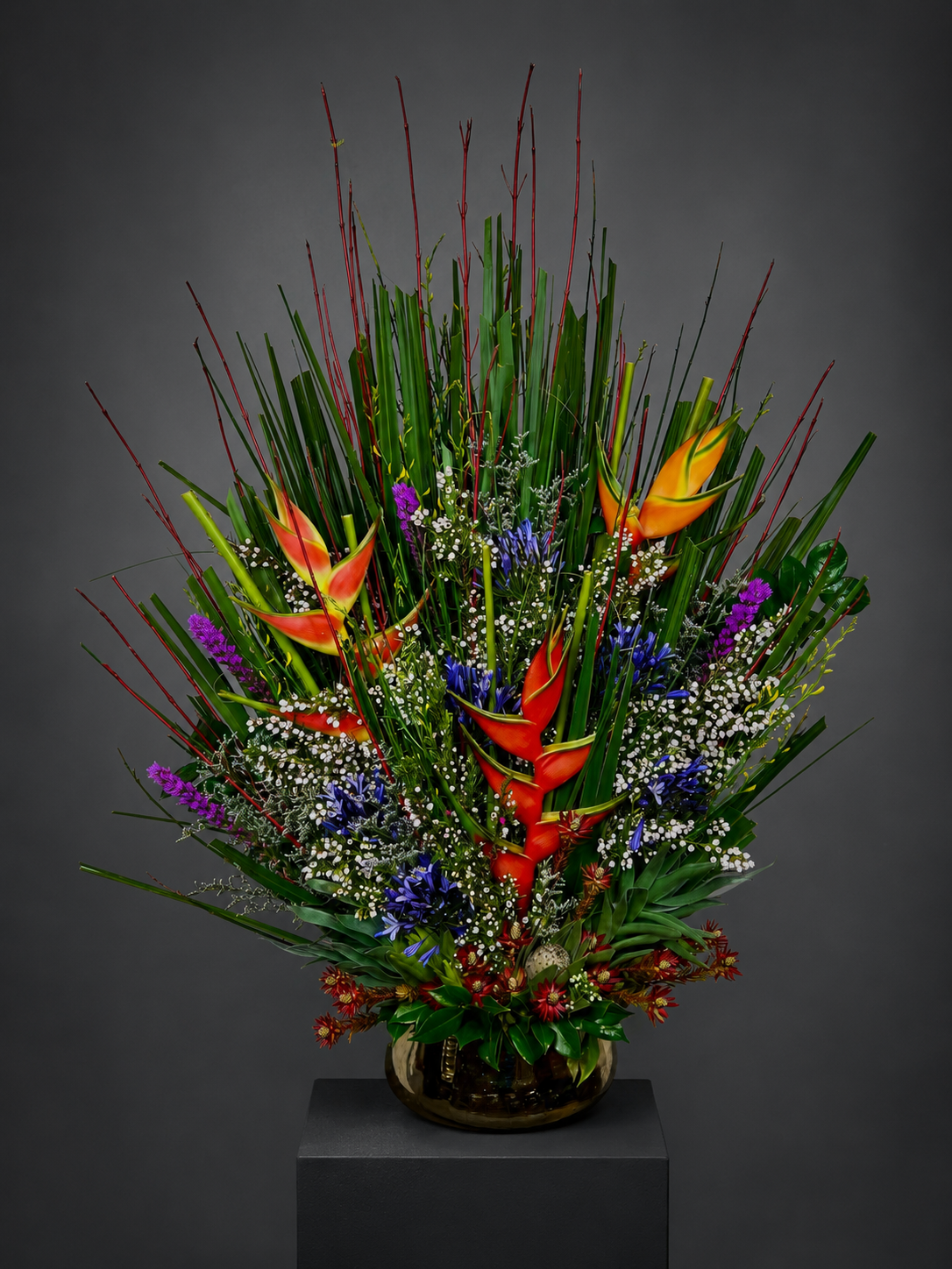 Long low floral arrangement for a counter or reception desk